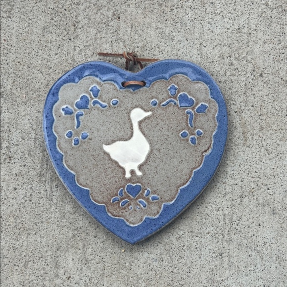 Heart-Shaped Ceramic Wall Hanging with Duck Design